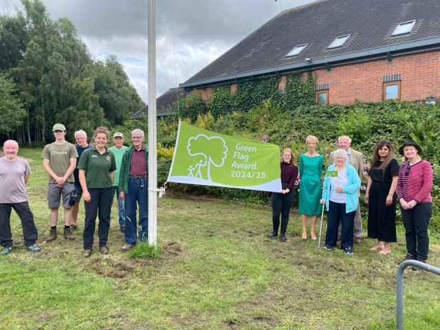 Brocks Hill: Brocks Hill volunteers with OWBC councillors and officers holding the Green Flag. (L-R) Barry Edwards, Luke Kitchener, John Grew, Park Ranger Eleanor Pratt, Dave Wayman, Dave Tebbut, Lolly Tunnicliffe, OWBC CEO Anne Court, Pat Tebbut, Cllr Bill Boulter, Leader of OWBC Cllr Samia Haq, Julia Cave