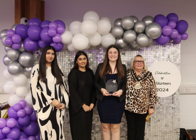 Chloe Mushen collects her award from Mayor Clare Kozlowski (right) and Rabia Murtaza and Hajirah Patel (left) from award sponsors Bond Adams Solicitors.