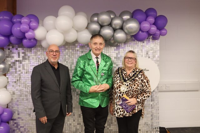 Paul Checkland from Paul & Friends collects his award from Mayor Clare Kozlowski (right) and Moin Durrani (left) on behalf of award sponsors Universal Flexible Packing Ltd